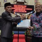 Nelson Pomalingo dan Syam T. Ase