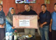 Kepala BKAD Kabupaten Gorontalo Beri Penghormatan kepada Pegawai Purna Tugas