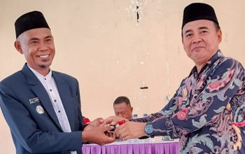 Arif Djahala Pimpin Bintauna, Sertijab Camat Diwarnai Prosesi Adat