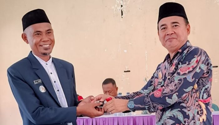 Arif Djahala Pimpin Bintauna, Sertijab Camat Diwarnai Prosesi Adat